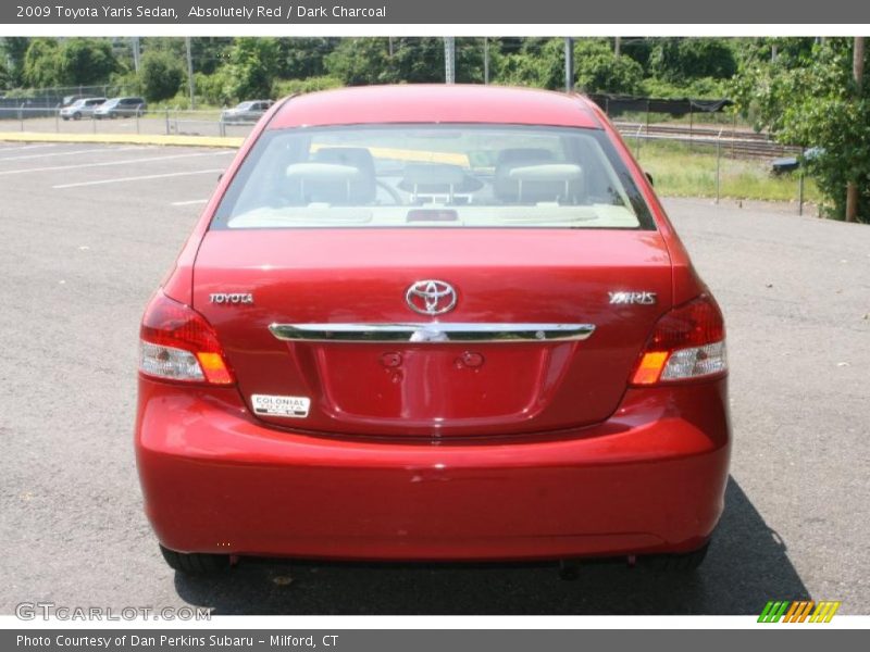 Absolutely Red / Dark Charcoal 2009 Toyota Yaris Sedan