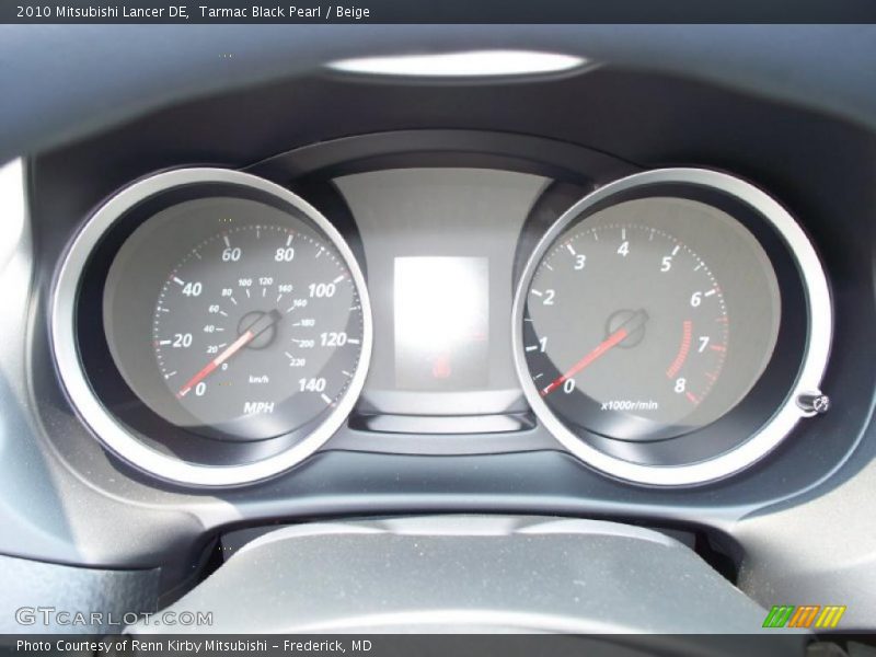 Tarmac Black Pearl / Beige 2010 Mitsubishi Lancer DE