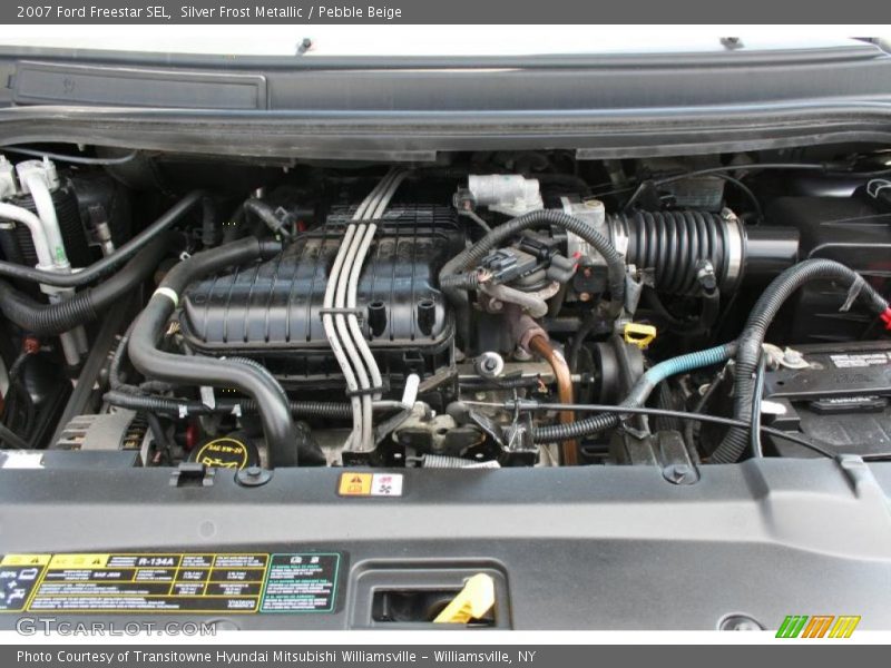 Silver Frost Metallic / Pebble Beige 2007 Ford Freestar SEL