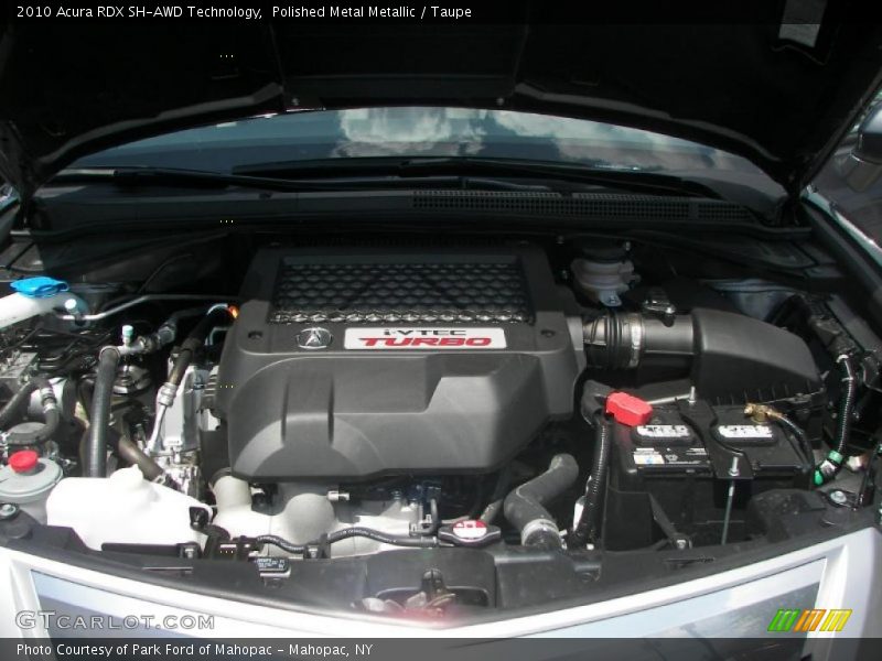 Polished Metal Metallic / Taupe 2010 Acura RDX SH-AWD Technology