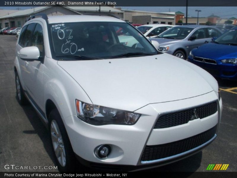 Diamond White Pearl / Black 2010 Mitsubishi Outlander SE 4WD