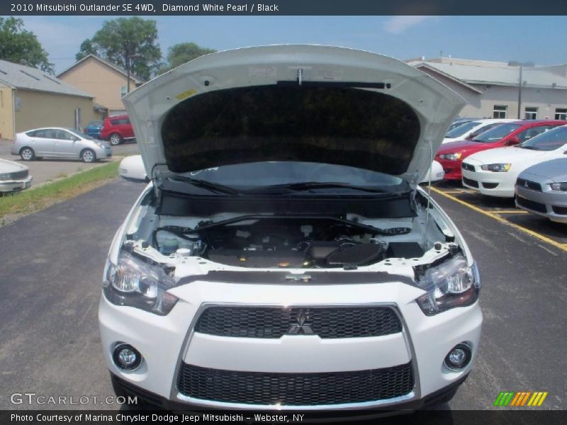 Diamond White Pearl / Black 2010 Mitsubishi Outlander SE 4WD