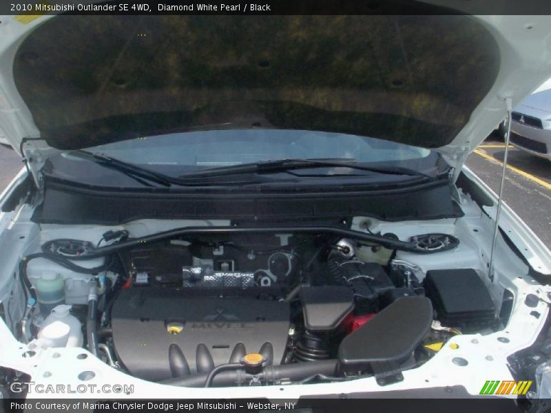 Diamond White Pearl / Black 2010 Mitsubishi Outlander SE 4WD