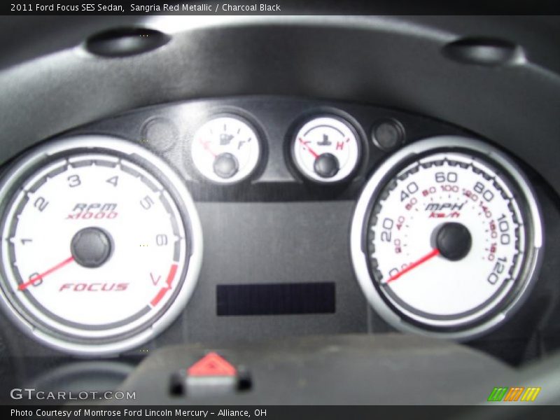 Sangria Red Metallic / Charcoal Black 2011 Ford Focus SES Sedan