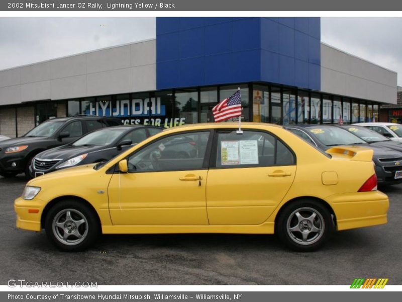 Lightning Yellow / Black 2002 Mitsubishi Lancer OZ Rally