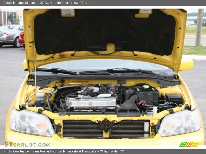 Lightning Yellow / Black 2002 Mitsubishi Lancer OZ Rally
