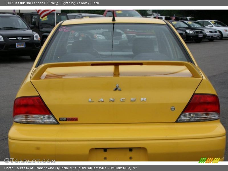 Lightning Yellow / Black 2002 Mitsubishi Lancer OZ Rally