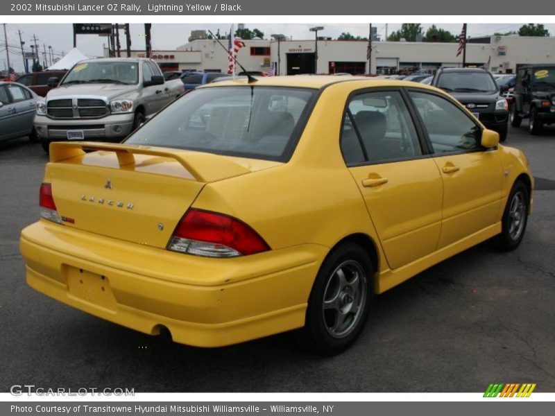 Lightning Yellow / Black 2002 Mitsubishi Lancer OZ Rally