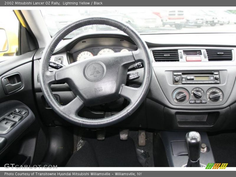 Lightning Yellow / Black 2002 Mitsubishi Lancer OZ Rally