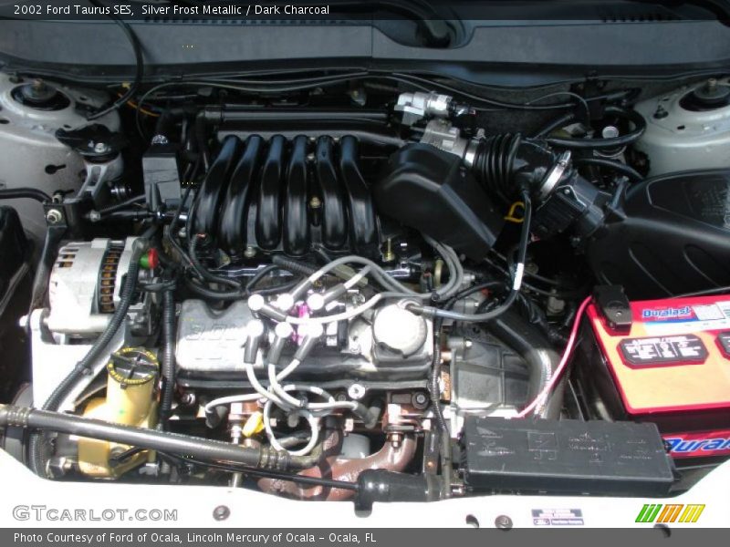 Silver Frost Metallic / Dark Charcoal 2002 Ford Taurus SES