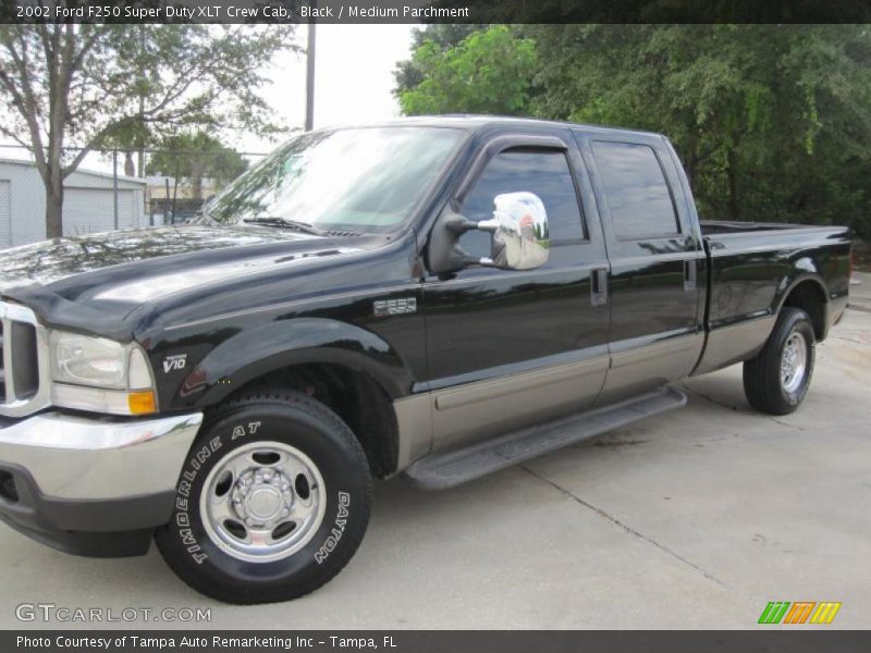 Black / Medium Parchment 2002 Ford F250 Super Duty XLT Crew Cab