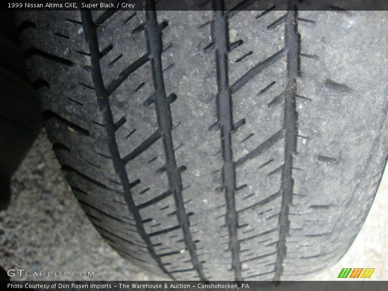 Super Black / Grey 1999 Nissan Altima GXE