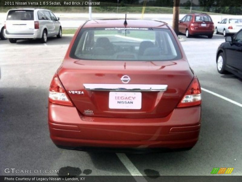 Red Brick / Charcoal 2011 Nissan Versa 1.8 S Sedan