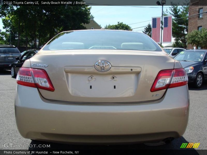 Sandy Beach Metallic / Bisque 2010 Toyota Camry LE
