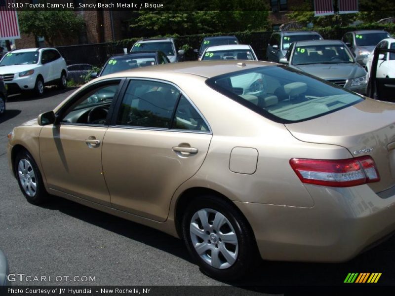 Sandy Beach Metallic / Bisque 2010 Toyota Camry LE