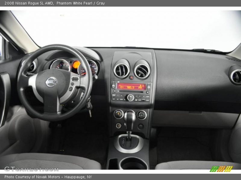Phantom White Pearl / Gray 2008 Nissan Rogue SL AWD