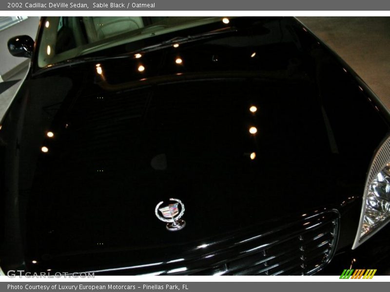 Sable Black / Oatmeal 2002 Cadillac DeVille Sedan