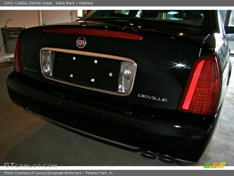 Sable Black / Oatmeal 2002 Cadillac DeVille Sedan