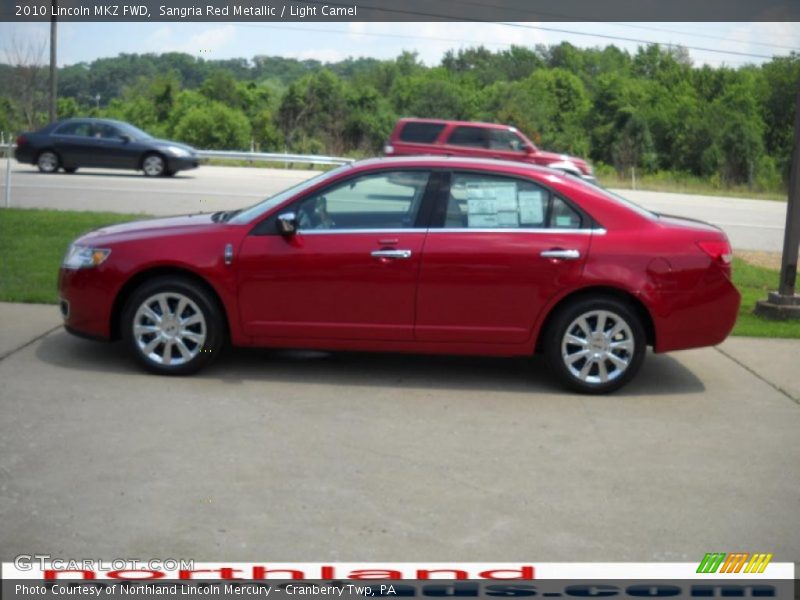 Sangria Red Metallic / Light Camel 2010 Lincoln MKZ FWD