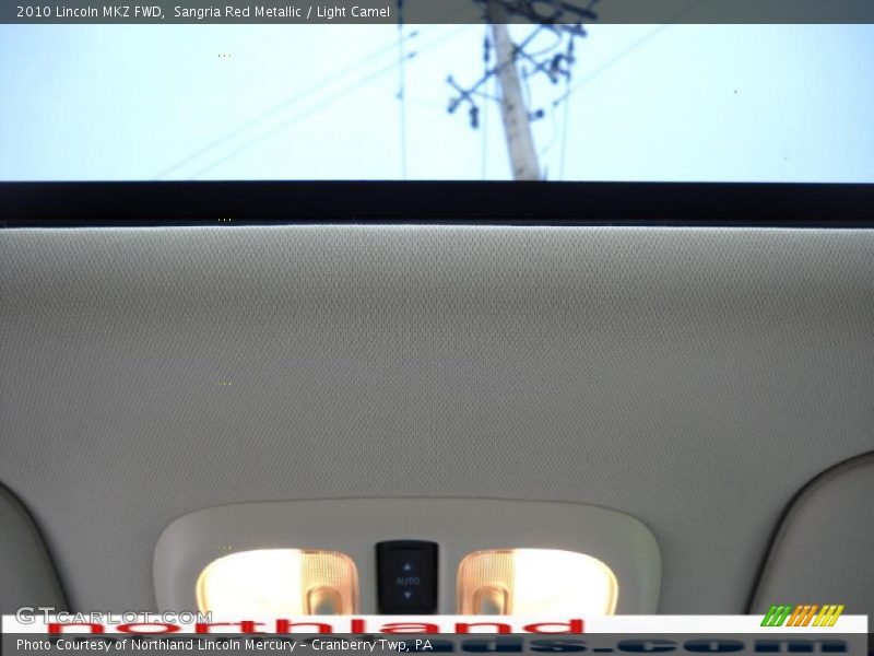 Sangria Red Metallic / Light Camel 2010 Lincoln MKZ FWD