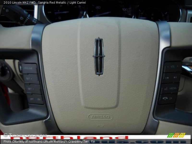 Sangria Red Metallic / Light Camel 2010 Lincoln MKZ FWD