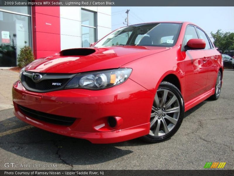 Lightning Red / Carbon Black 2009 Subaru Impreza WRX Sedan