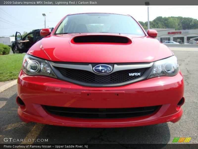 Lightning Red / Carbon Black 2009 Subaru Impreza WRX Sedan