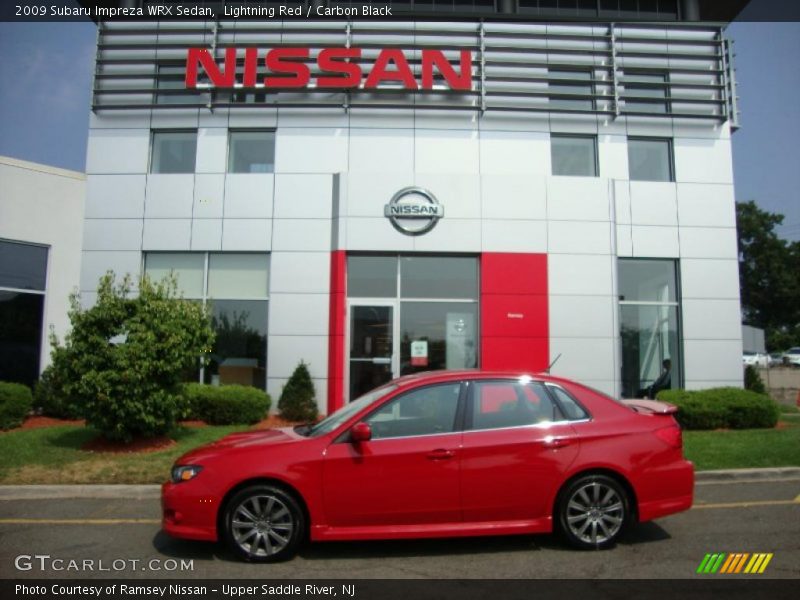 Lightning Red / Carbon Black 2009 Subaru Impreza WRX Sedan