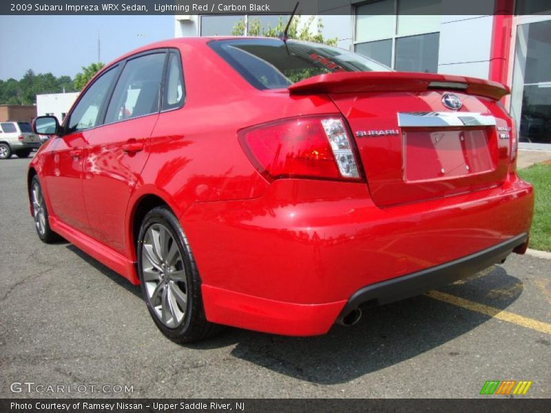 Lightning Red / Carbon Black 2009 Subaru Impreza WRX Sedan