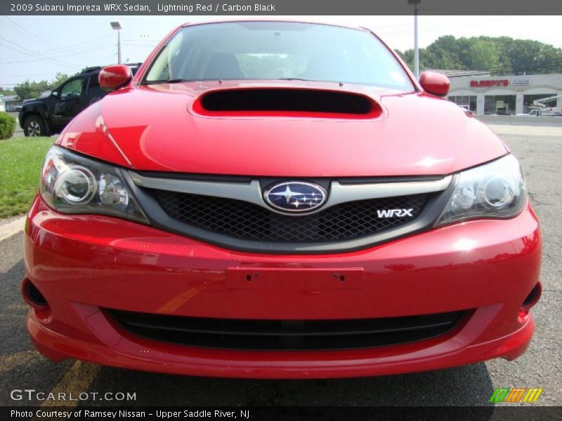 Lightning Red / Carbon Black 2009 Subaru Impreza WRX Sedan