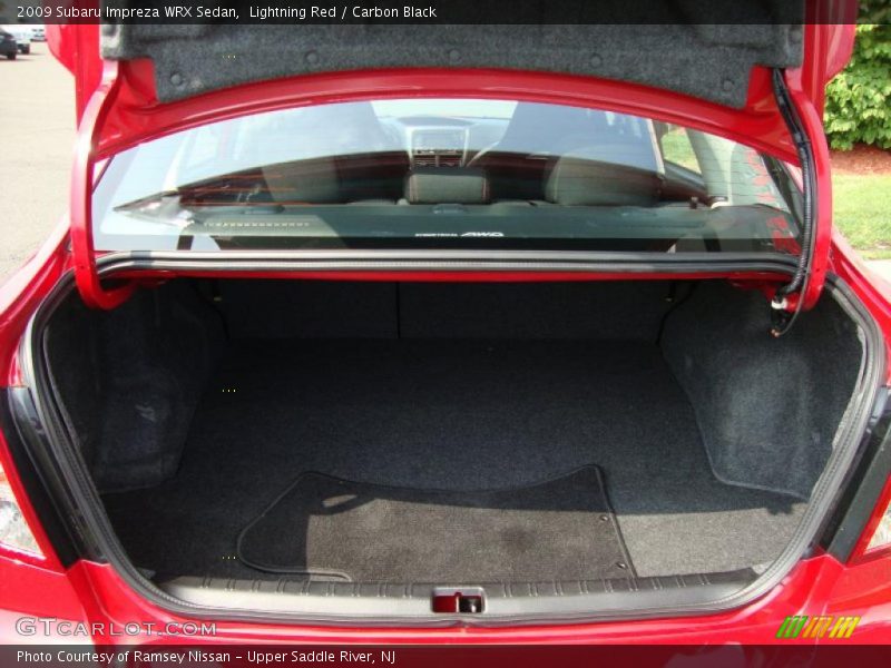 Lightning Red / Carbon Black 2009 Subaru Impreza WRX Sedan