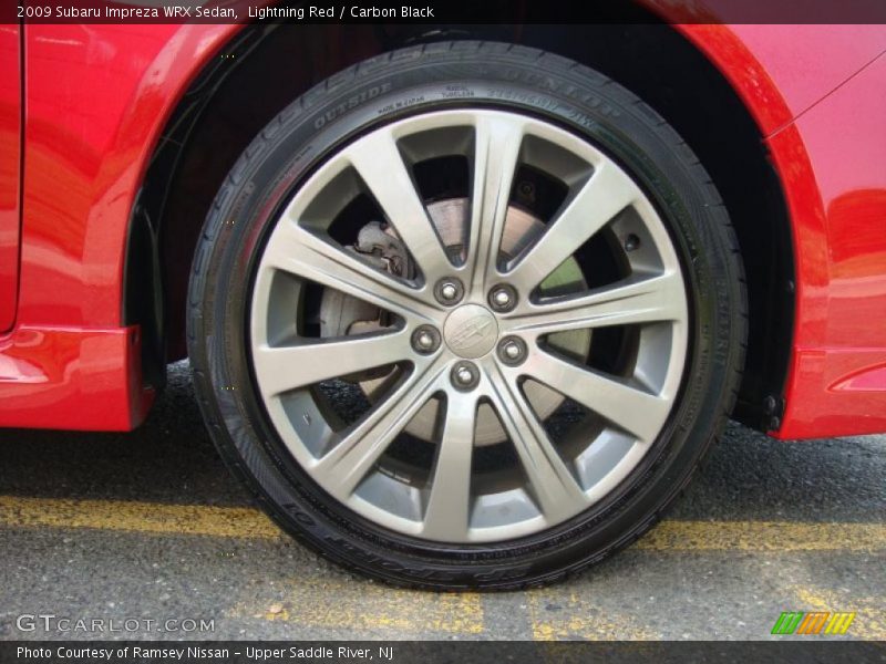 Lightning Red / Carbon Black 2009 Subaru Impreza WRX Sedan