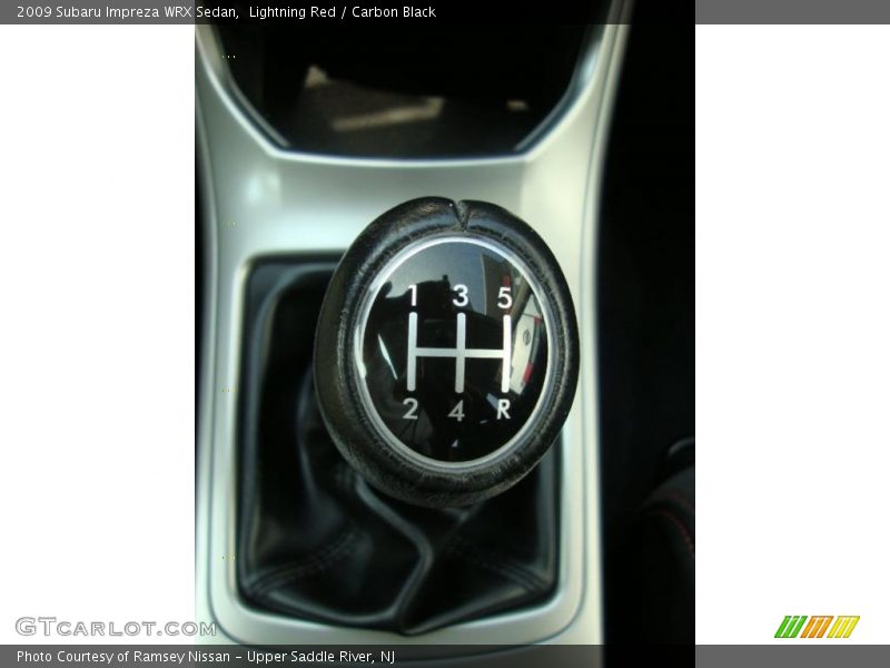 Lightning Red / Carbon Black 2009 Subaru Impreza WRX Sedan