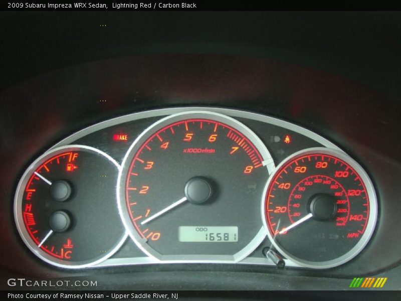 Lightning Red / Carbon Black 2009 Subaru Impreza WRX Sedan
