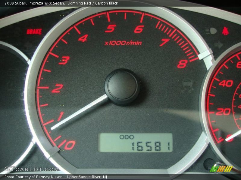 Lightning Red / Carbon Black 2009 Subaru Impreza WRX Sedan