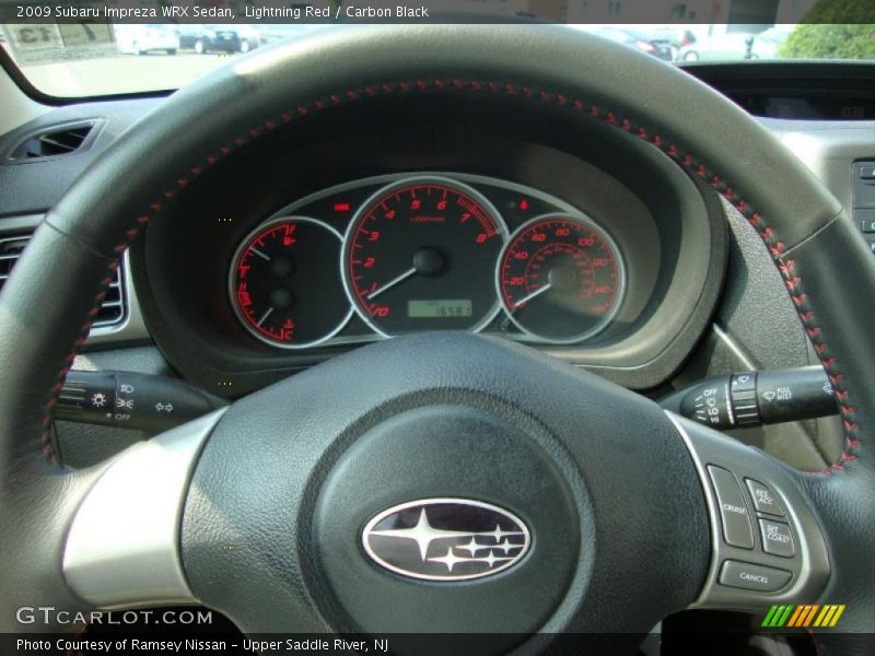 Lightning Red / Carbon Black 2009 Subaru Impreza WRX Sedan