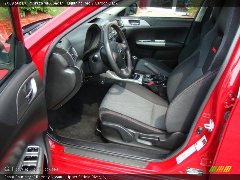 Lightning Red / Carbon Black 2009 Subaru Impreza WRX Sedan
