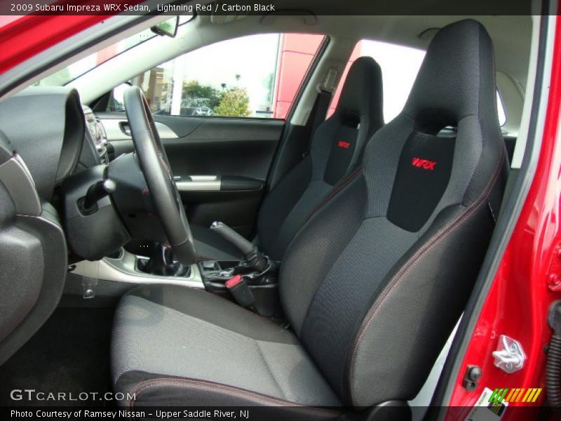 Lightning Red / Carbon Black 2009 Subaru Impreza WRX Sedan