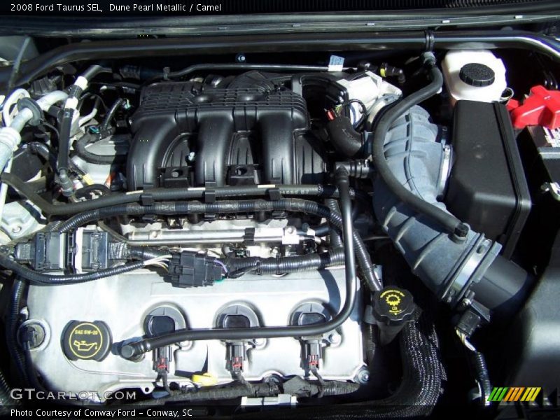 Dune Pearl Metallic / Camel 2008 Ford Taurus SEL