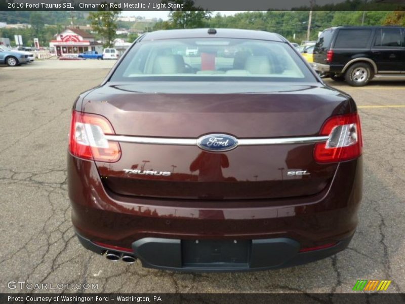 Cinnamon Red Metallic / Light Stone 2010 Ford Taurus SEL
