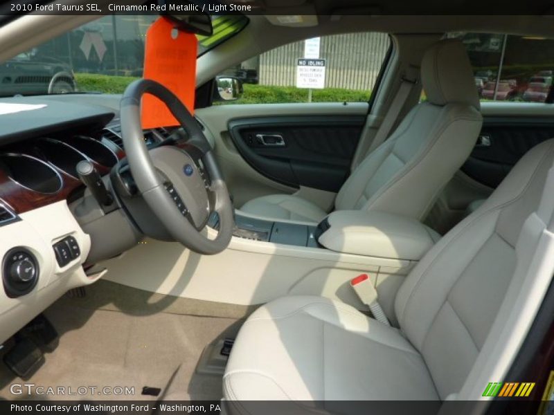 Cinnamon Red Metallic / Light Stone 2010 Ford Taurus SEL