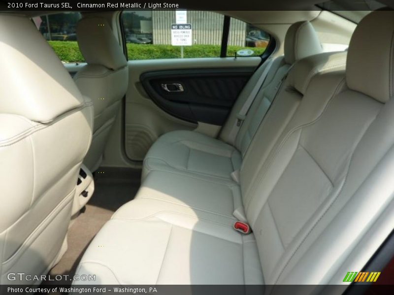 Cinnamon Red Metallic / Light Stone 2010 Ford Taurus SEL