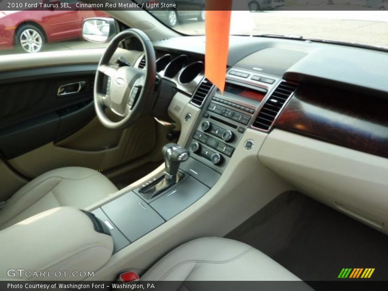 Cinnamon Red Metallic / Light Stone 2010 Ford Taurus SEL