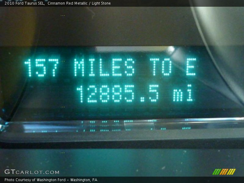 Cinnamon Red Metallic / Light Stone 2010 Ford Taurus SEL