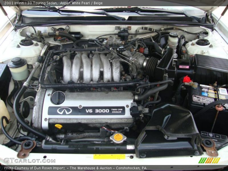 Aspen White Pearl / Beige 2001 Infiniti I 30 Touring Sedan