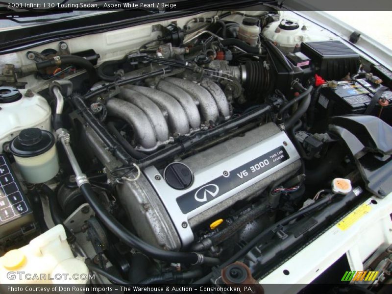 Aspen White Pearl / Beige 2001 Infiniti I 30 Touring Sedan