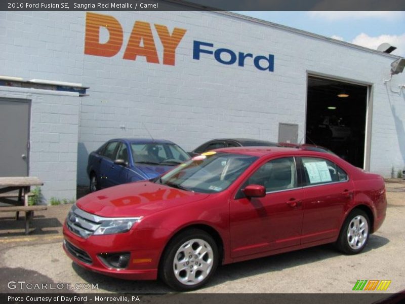 Sangria Red Metallic / Camel 2010 Ford Fusion SE