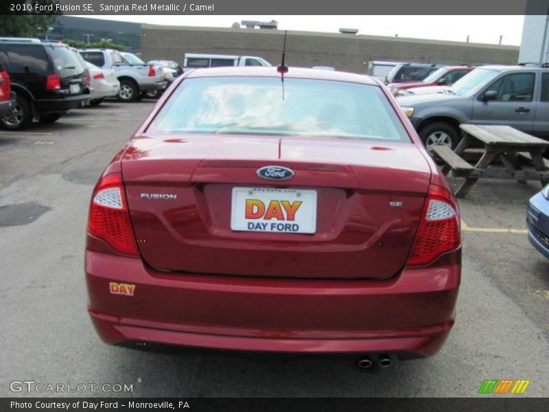 Sangria Red Metallic / Camel 2010 Ford Fusion SE