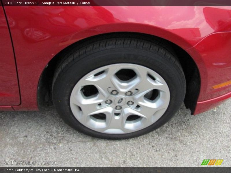 Sangria Red Metallic / Camel 2010 Ford Fusion SE