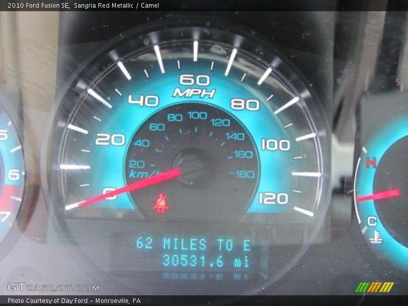 Sangria Red Metallic / Camel 2010 Ford Fusion SE